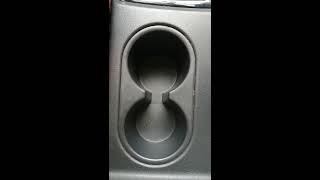 How remove cupholder on handbreak side of mitsubishi xpander