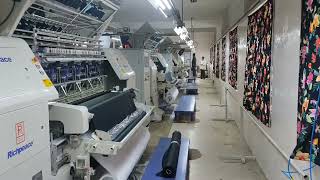 Richpeace Multi needle Shuttle Quilting Machines running for down jacket in customer's factory