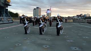 The Band of H M  Royal Marines on HMS Bulwark, with Sunset Ceremony