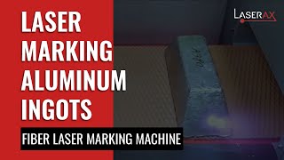 Laser Marking of Aluminum Ingots Moving on a Conveyor