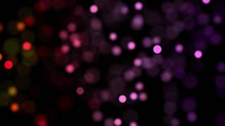 Colorful Bright Bokeh Lights on a dark Atmospheric Background. Relaxing Screensaver. Free Footage.