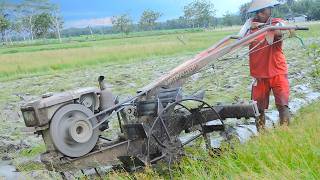 Ploughing Dirt Till Finish Using A Hand Tractor