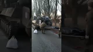 Russian Soldiers loading their dead to be transported away #UkraineRussiaWar #Ukraine️