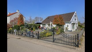 Deze charmante bungalow met uitzicht op een natuurgebied laat je sprakeloos achter