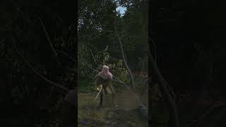 A Young Man Debranching a Felled Tree With His Axe