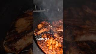 delicious pork chops over fire #charcoalgrill #grillmasters #grilling #kamadogrill #food