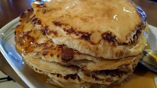 Τηγανητες γλυκές με μέλι Sweet pancakes recipe tiganites with milk and honey. Slow motion