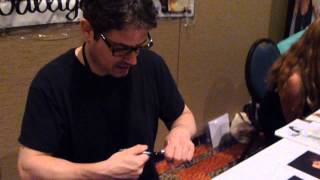 Zach Galligan from Gremlins signing several autographs - TopSignatures.com