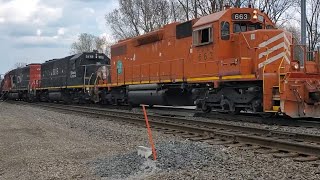 Colorful fallen flag EMD's on a local