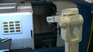 Kawasaki FS010L Robot loading a Femco HL35  lathe