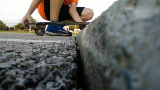 ( Skate Boarding) How to ride off of a curb!!