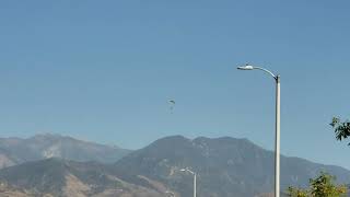 Paragliders landing at Hangar 24 Brewery