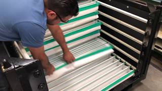 ORBIS Custom Metal Solutions - Textile Slider in Rack