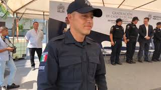 En compañía de los cadetes recién graduados de la Vigésima Segunda Generación de Policías