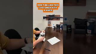 DON'T play with your knife in a gun store