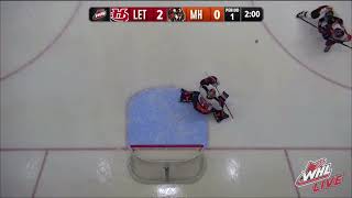 A PUCK GETS BROKEN By A Lethbridge Hurricanes Player Off Shot (WHL)