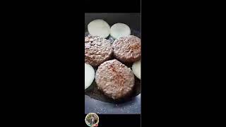 Burger white onion on the pan frying