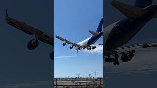 Western Global Airlines Boeing 747-47UF landing at LAX runway 25L