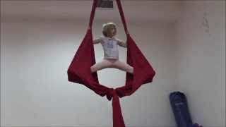 Aerial fabric. Figure “Angel”. 8 year old girl performing.