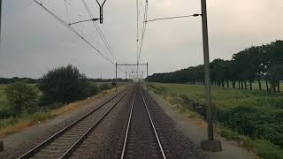 Sproeien over het spoor tussen Deurne en Griendtsveen.  26-07-2018