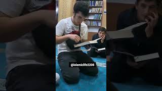 He is reading quran by fingers.#shortvideo #shorts #islamiclife