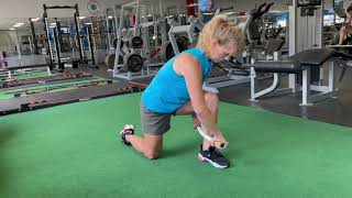 Self-Myofascial Release to the Calves/Achilles with Stick