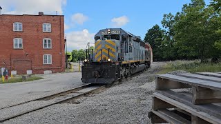 W&LE #6386 navigates the tight curve behind Root Candle in Medina Ohio 6-9-24