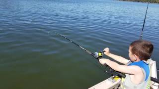 My Son reeling in a nice blue cat