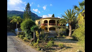 A sunny and private villa with a large tropical garden and sea views for sale in Calpe, Costa Blanca