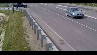 Cyclist smashes into a car bonnet after vehicle crashes into him