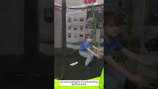 Exhibition Backflip Extravaganza: Little Boy Soaring with Joy on Our Giant Trampoline!