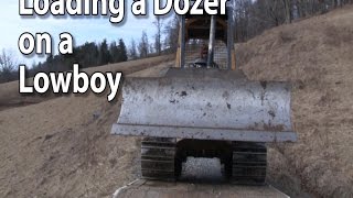 Loading a Dozer on a Tag Along Lowboy