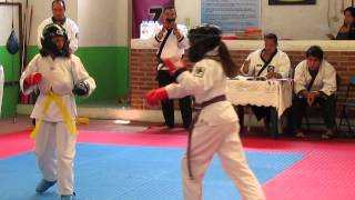 Orange/blue belt karate combat in Mexico city