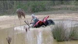 James tips in the snorkel test hole, and Noah at the Sandy Pond!