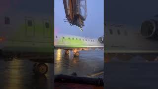 De-Icing a plane before take off #canada #winter #deicing #plane #arctic #snow #ice #aviation