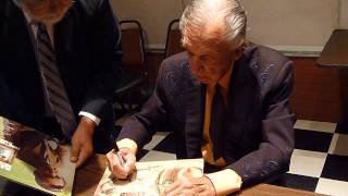 Country Hall of Fame Singer Ray Price signing several autographs - TopSignatures.com