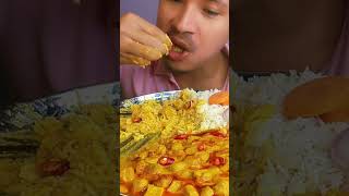 eating spicy soya chunks curry with rice