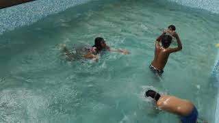 children enjoying in pool, summer time(1)