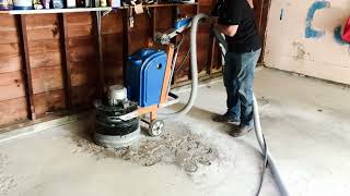 Complete Garage Renovation. Concrete repair, epoxy coating and paint.