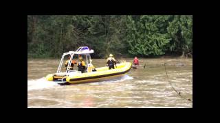 Rescuers Pull Kayakers From the Willamette River in West Linn Oregon