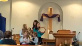 The girls singing at church