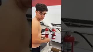 Guy buys 3 fire extinguishers in building with alarms going off meme