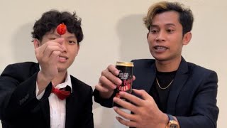 Di tantang minum colla ghost pepper