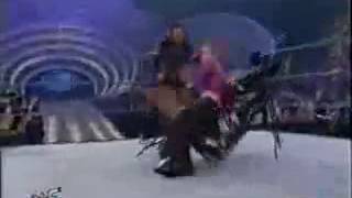 Jeff Hardy swanton bomb on Devon Dudley through table