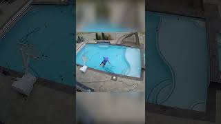 Man's ladder overturned into pool #shorts