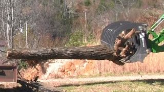 Using a Grapple to Hold and Saw Firewood Logs