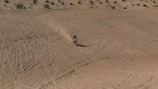 4 Dirt Bikes Jumping in Sand Dunes