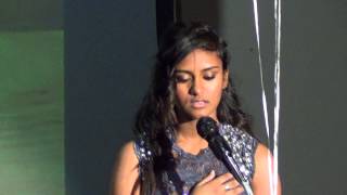 Lenisha Rajapaksa singing national anthem at Cashman Midle School