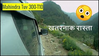 Driving Mahindra Tuv 300 on the edges of mountains