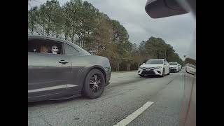 Camaro driver challenges Tesla to a race at a traffic light